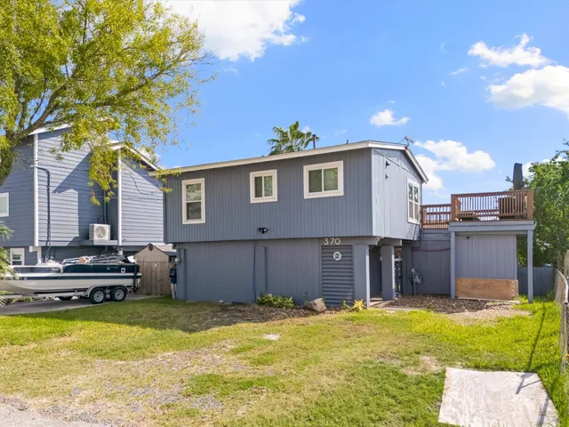 a front view of a house with swimming pool