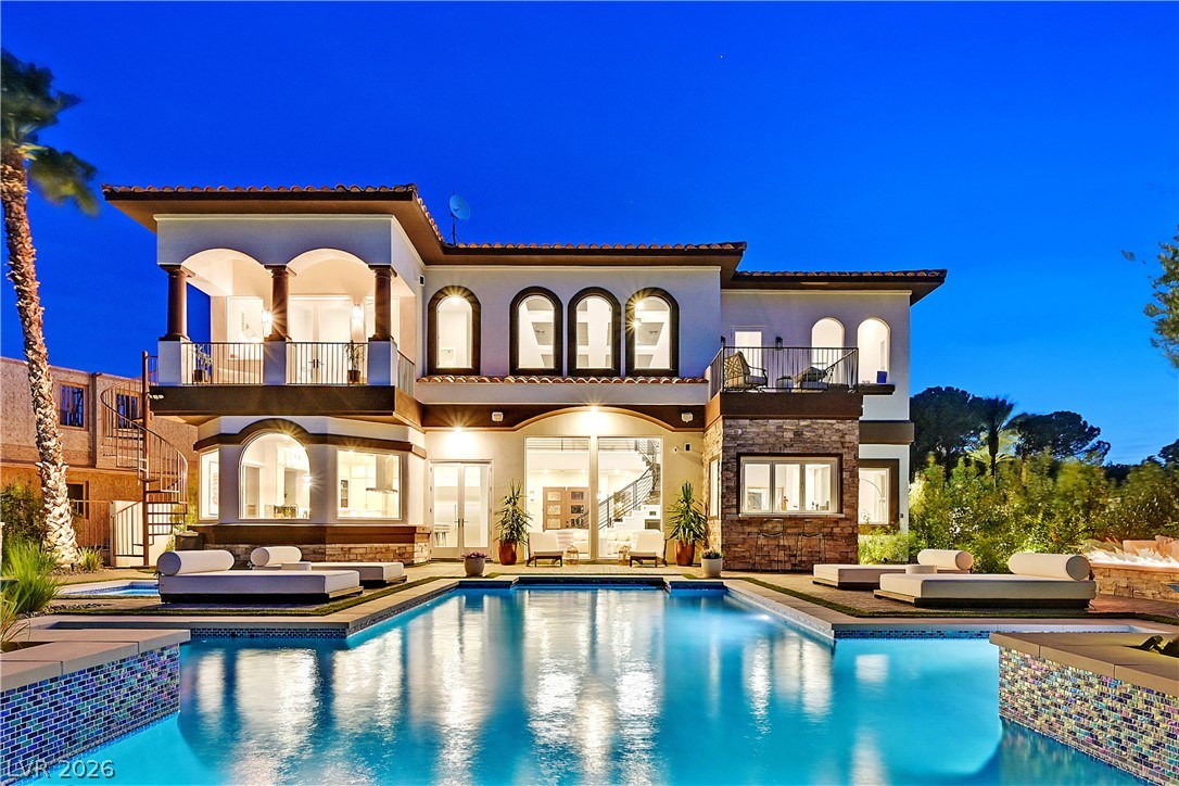 6 Rue Du Ville Henderson, NV 89011 - Photo 1 of 99 This magnificent residence boasts a resort-style pool and elegant architectural details, perfect for luxurious living.