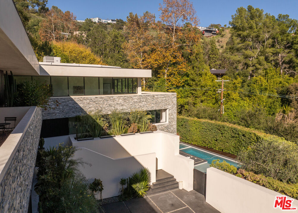 7681 Willow Glen Road Los Angeles, CA 90046 - Photo 20 of 71 an aerial view of a house with a yard
