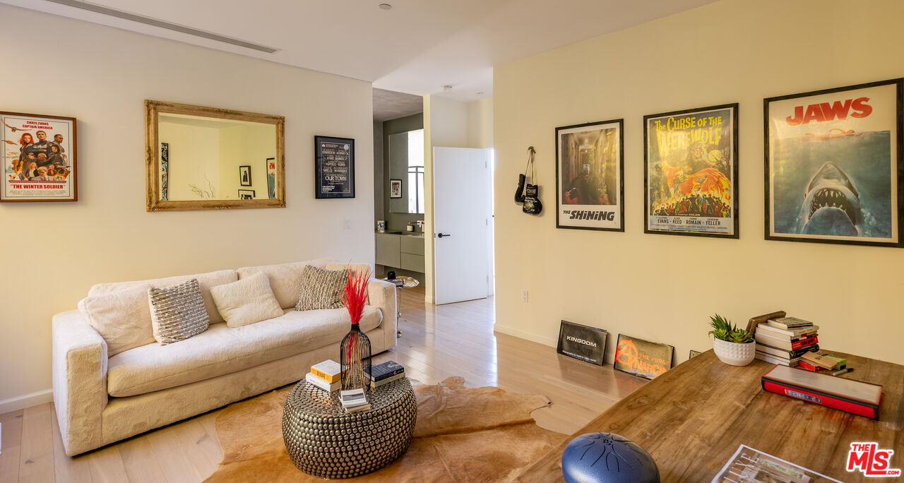 7681 Willow Glen Road Los Angeles, CA 90046 - Photo 43 of 71 a living room with furniture and a couch