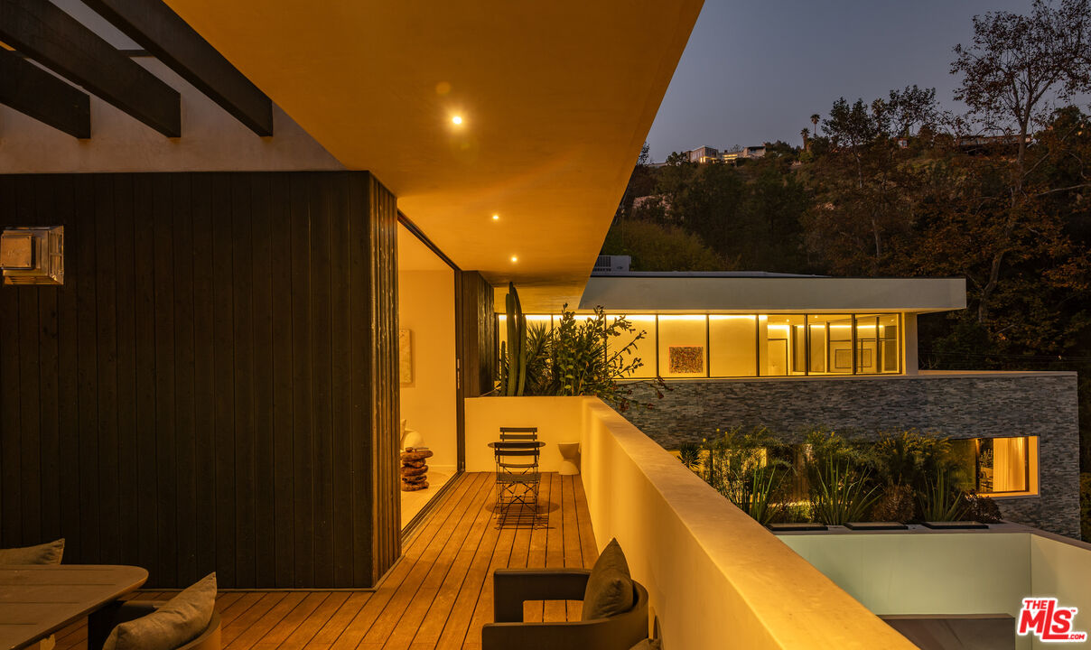 7681 Willow Glen Road Los Angeles, CA 90046 - Photo 60 of 71 a view of swimming pool with seating space