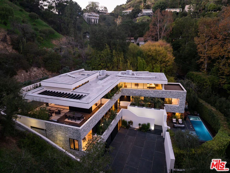 7681 Willow Glen Road Los Angeles, CA 90046 - Photo 67 of 71 an aerial view of a house with a yard basket ball court and outdoor seating
