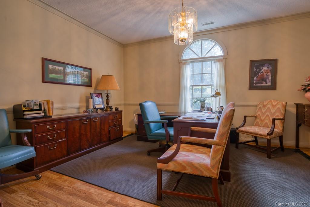 77 Club Road Tryon, NC 28782 - Photo 29 of 35 a view of a workspace with furniture and a window
