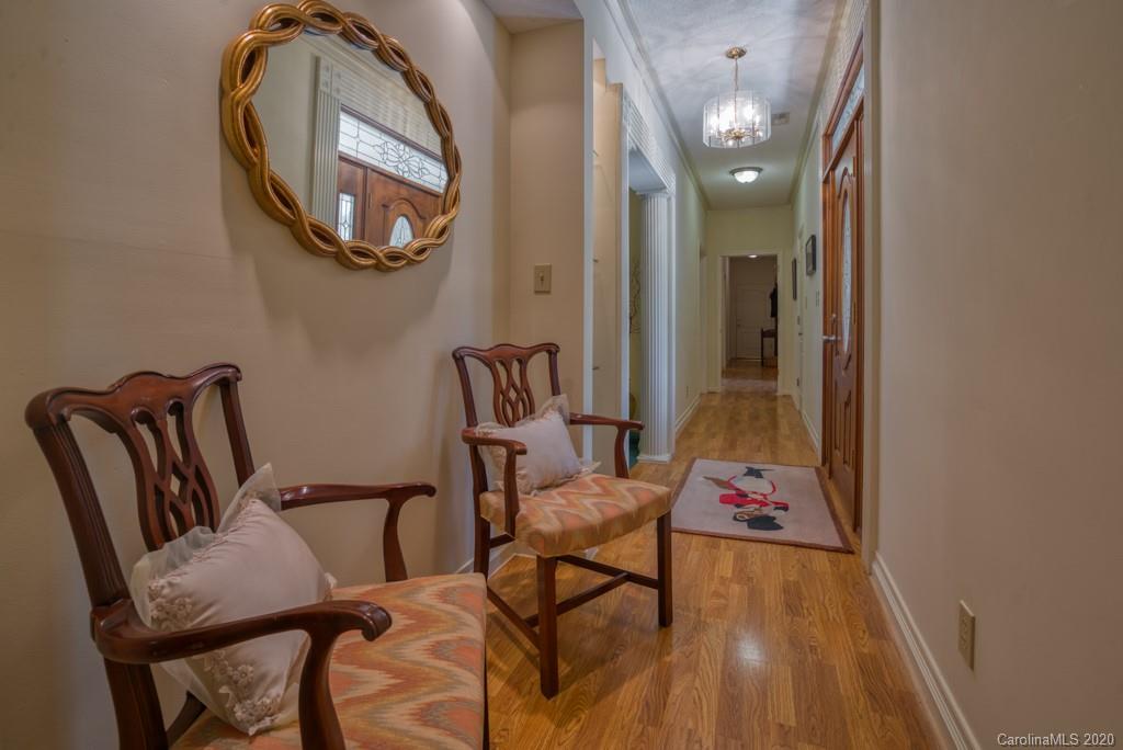 77 Club Road Tryon, NC 28782 - Photo 30 of 35 a view of a livingroom with furniture and a mirror