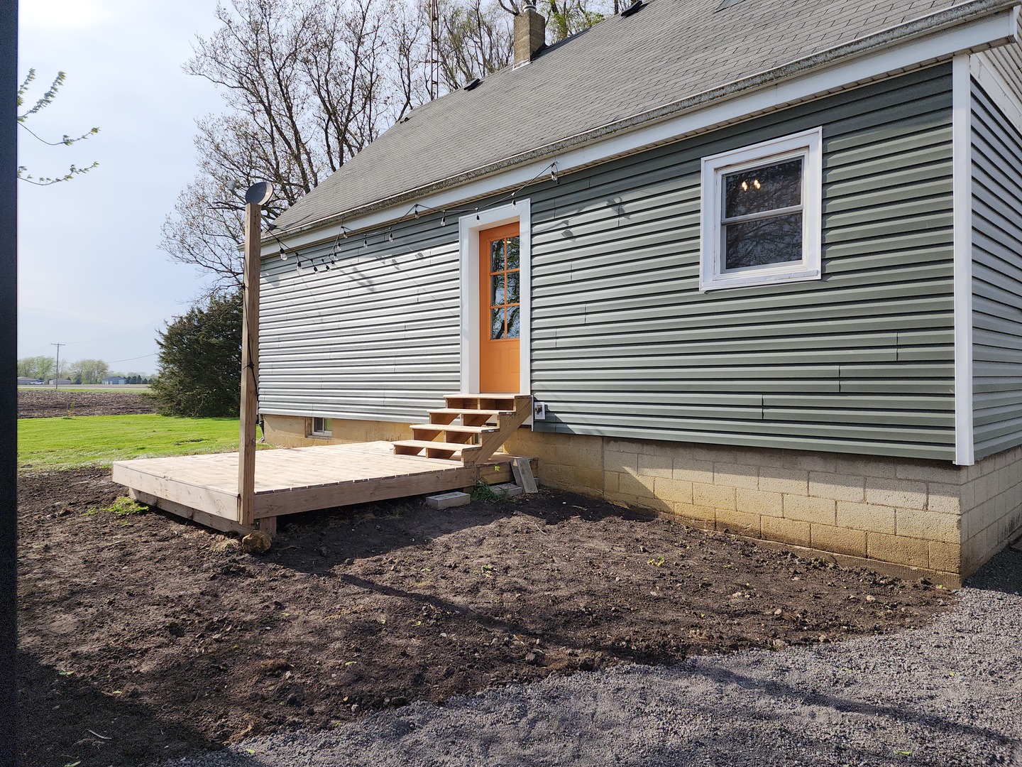 6522 East 3500S Road St. Anne, IL 60964 - Photo 17 of 20 a view of a house with a yard