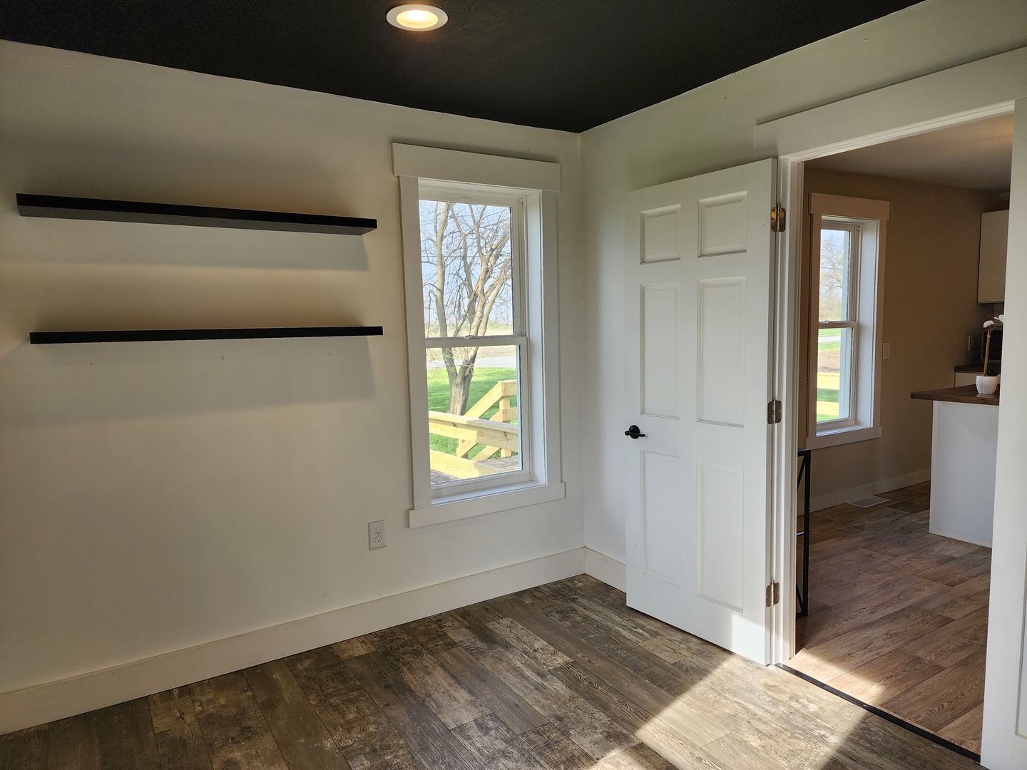 6522 East 3500S Road St. Anne, IL 60964 - Photo 6 of 20 a view of an empty room and window