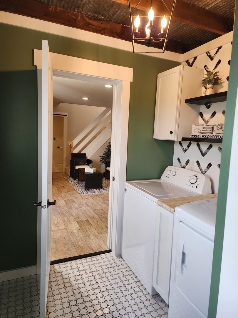 6522 East 3500S Road St. Anne, IL 60964 - Photo 8 of 20 a hallway with a washer and dryer