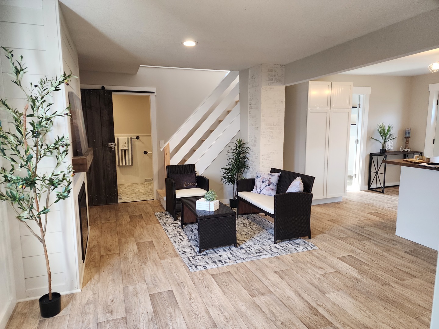 6522 East 3500S Road St. Anne, IL 60964 - Photo 9 of 20 a living room with furniture and a wooden floor