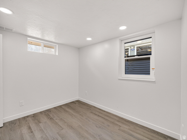 74 South 300 East Springville, UT 84663 - Photo 20 of 48 Room featuring light wood-finish flooring, recessed lighting, and crisp white walls