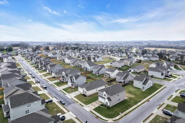 an aerial view of a city with lots of residential buildings