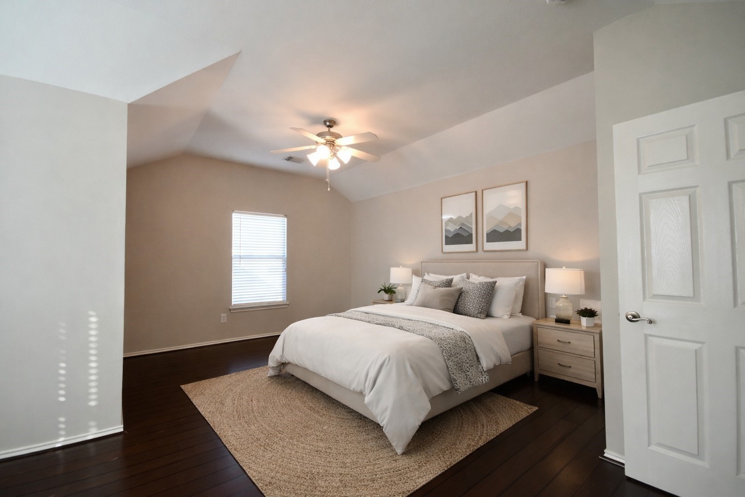 1706 Redwing Bluff Drive Houston, TX 77009 - Photo 11 of 24 a bedroom with a bed and a chandelier
