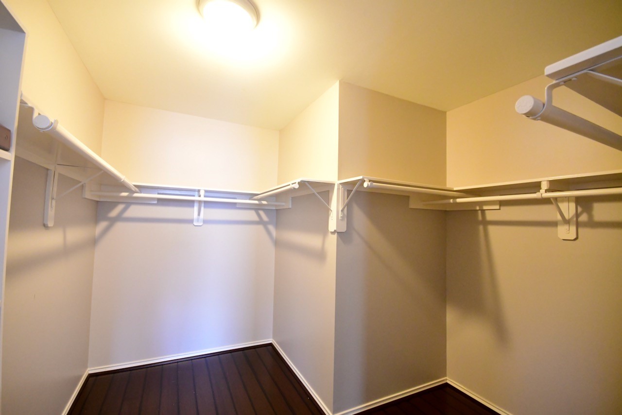 1706 Redwing Bluff Drive Houston, TX 77009 - Photo 14 of 24 a view of walk in closet with empty racks