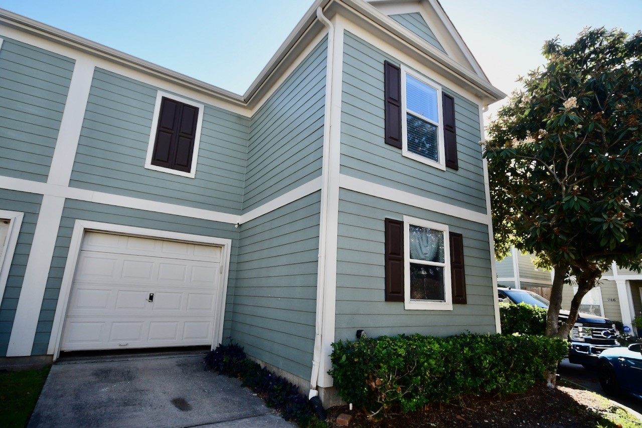 1706 Redwing Bluff Drive Houston, TX 77009 - Photo 20 of 24 a view of a house with a yard