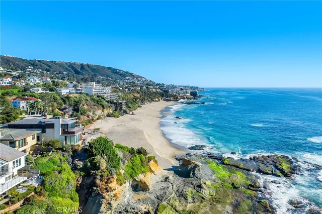 a view of a lake with a yard
