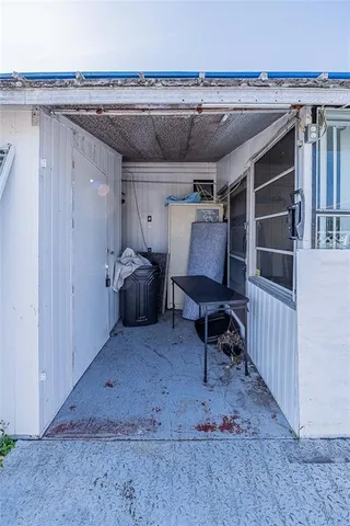 a view of storage and utility room