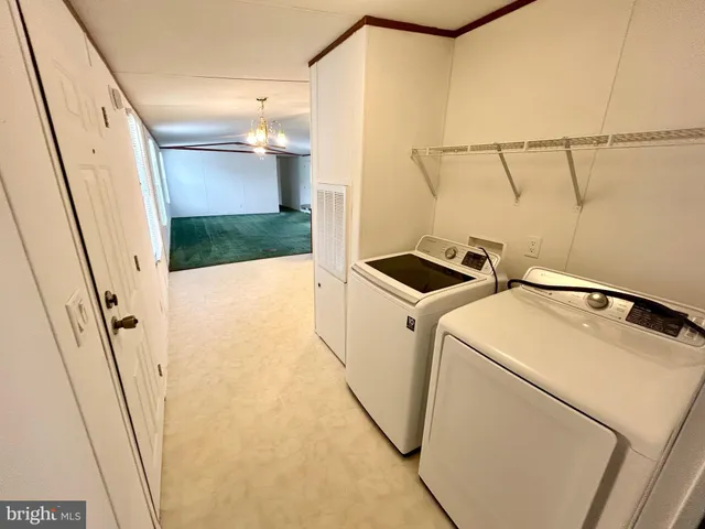 a view of utility room with washer and dryer