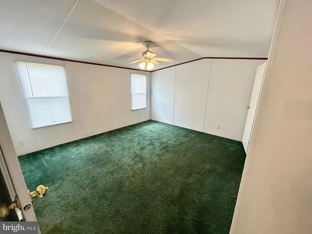 a view of a back yard from a room