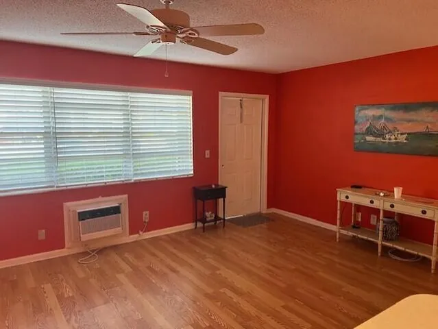 a room with furniture and a window