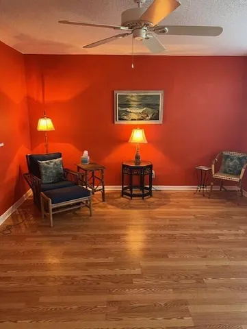 a room with pool table and a chandelier