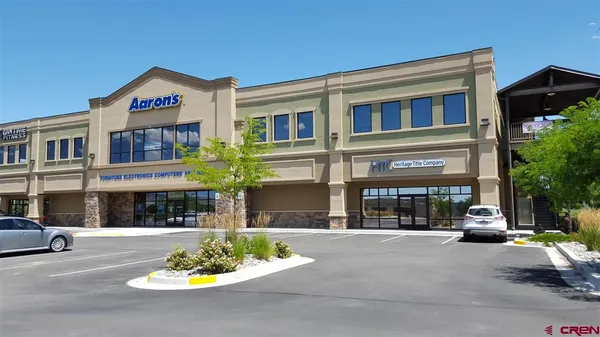 a front view of a building with street view