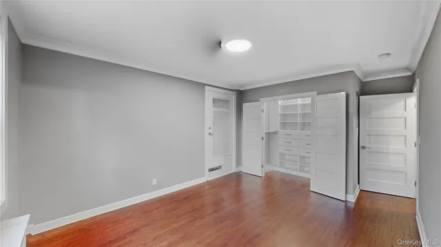 a view of an empty walk in closet