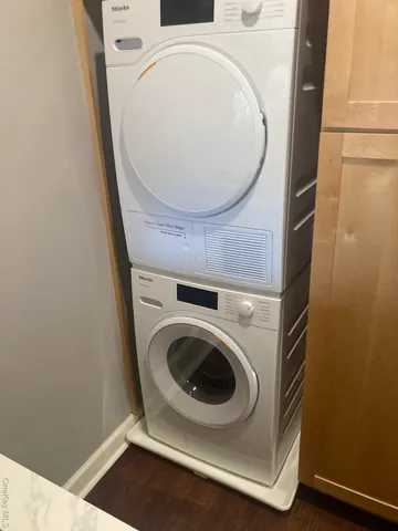 a kitchen with stainless steel appliances a refrigerator and a stove