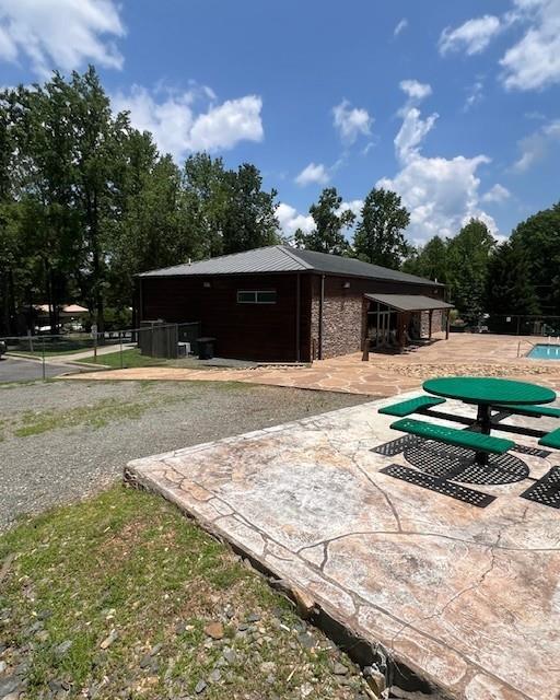 133 Adair Drive Ranger, GA 30734 - Photo 12 of 13 a front view of a house with garden