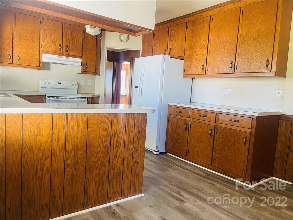 160 Bayleaf Drive Salisbury, NC 28146 - Photo 12 of 27 a kitchen with stainless steel appliances a refrigerator and cabinets