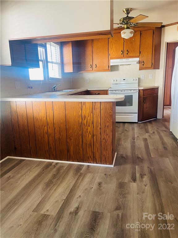 160 Bayleaf Drive Salisbury, NC 28146 - Photo 13 of 27 a view of a kitchen with wooden cabinets