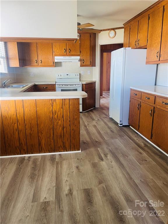 160 Bayleaf Drive Salisbury, NC 28146 - Photo 14 of 27 a kitchen with stainless steel appliances granite countertop a refrigerator and a stove