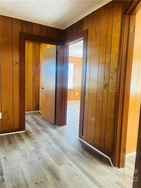 160 Bayleaf Drive Salisbury, NC 28146 - Photo 18 of 27 an empty room with closet and wooden floor