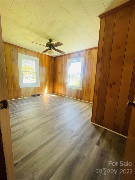 160 Bayleaf Drive Salisbury, NC 28146 - Photo 19 of 27 wooden floor in an empty room with a window