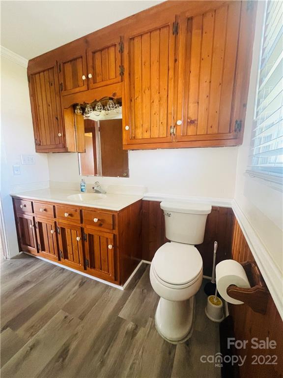 160 Bayleaf Drive Salisbury, NC 28146 - Photo 22 of 27 a bathroom with a toilet a sink and a mirror