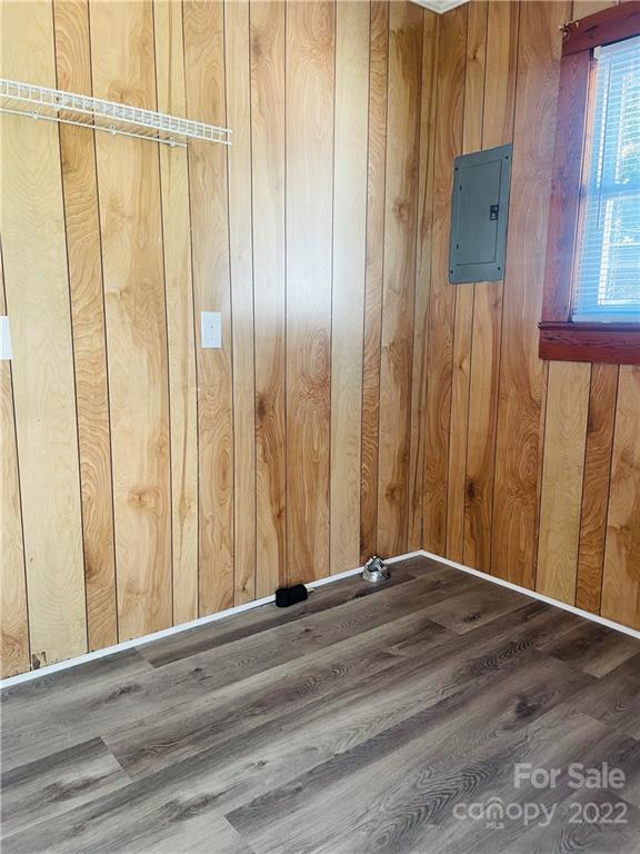 160 Bayleaf Drive Salisbury, NC 28146 - Photo 27 of 27 an empty room with wooden floor and windows