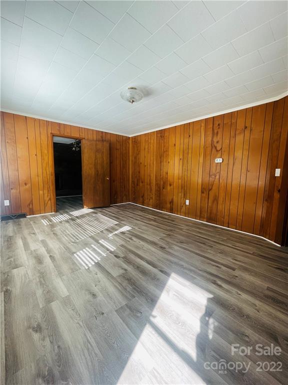 160 Bayleaf Drive Salisbury, NC 28146 - Photo 6 of 27 a view of a big room with wooden floor and windows