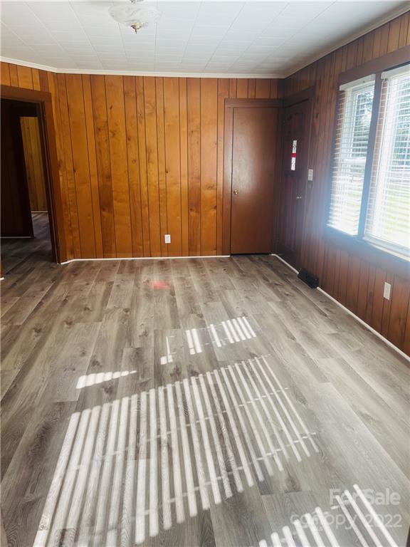 160 Bayleaf Drive Salisbury, NC 28146 - Photo 8 of 27 a view of an empty room with wooden floor and a window