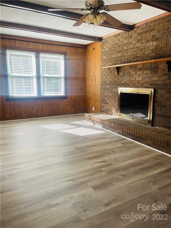 160 Bayleaf Drive Salisbury, NC 28146 - Photo 10 of 27 a view of an empty room with a fireplace and a window