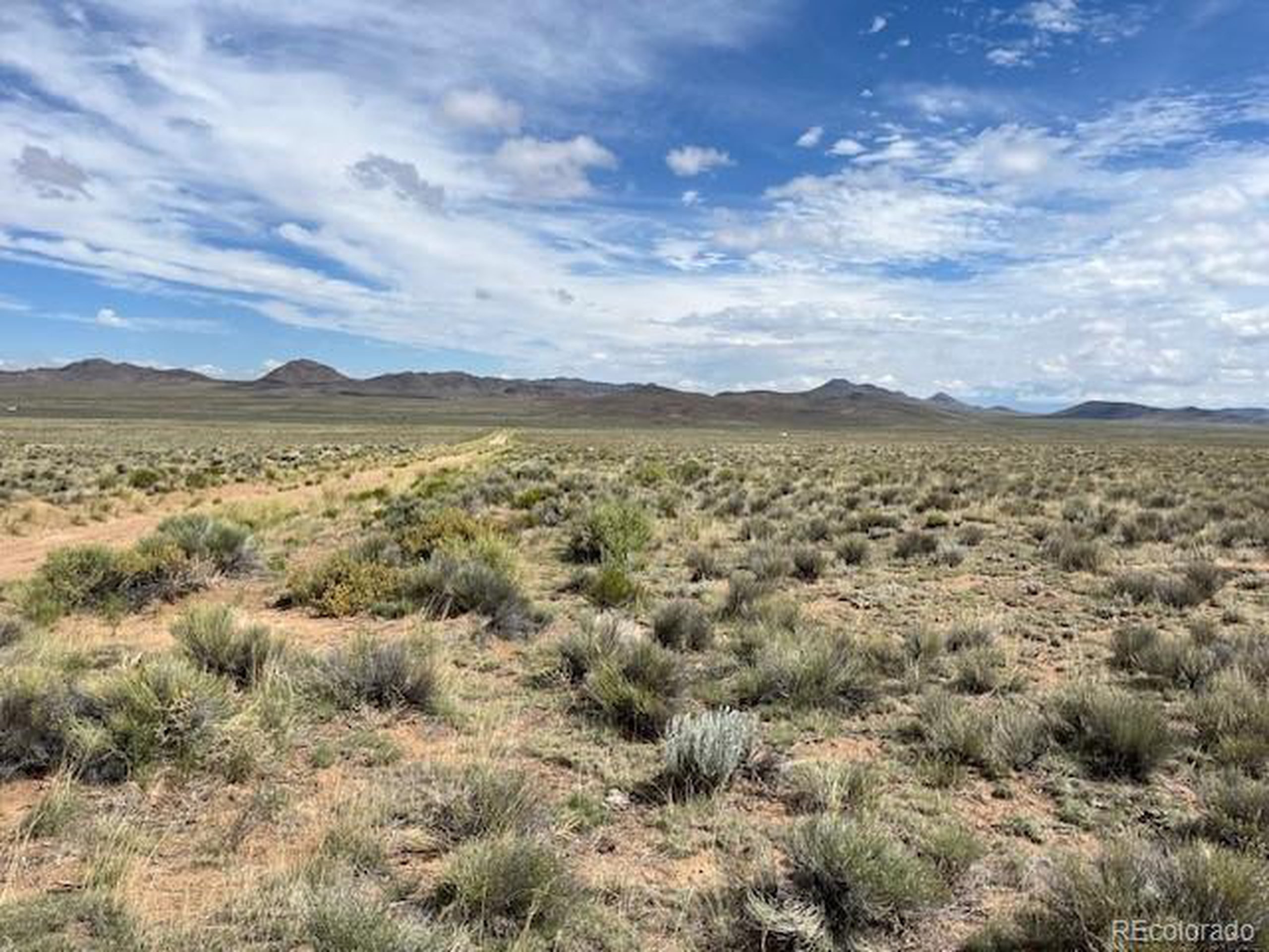 7 Jack Road Sanford, CO 81151 - Photo 8 of 11 a view of lake and mountain
