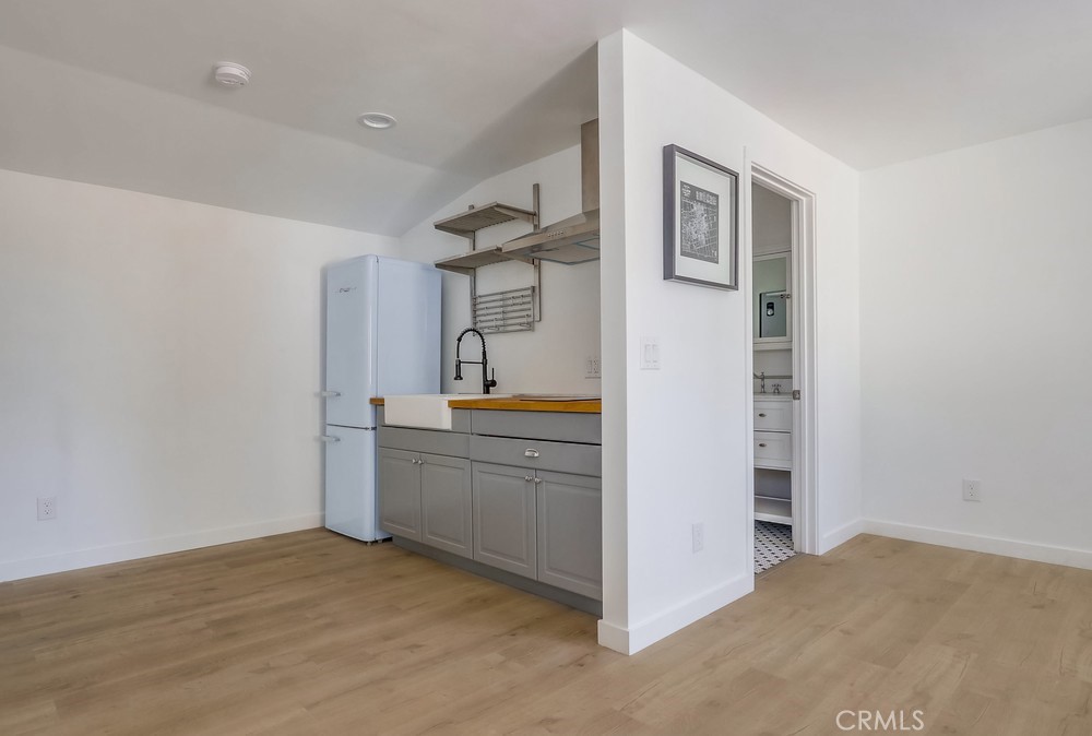 554 South Lemon Street, Unit B Anaheim, CA 92805 - Photo 7 of 10 a room with a kitchen and a sink