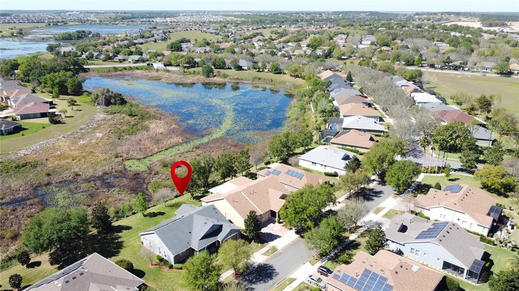 228 Bayou Bend Road Groveland, FL 34736 - Photo 2 of 54 an aerial view of residential houses with outdoor space