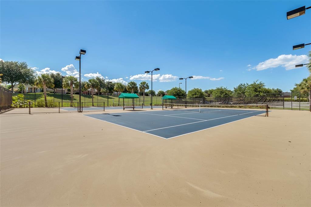 228 Bayou Bend Road Groveland, FL 34736 - Photo 50 of 54 a view of a tennis court