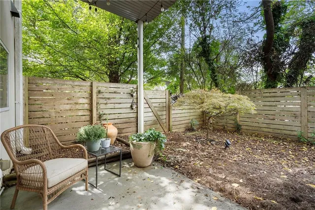 a view of a chairs in a backyard