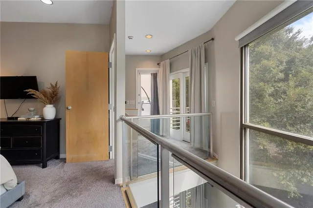 a bedroom with bed and window