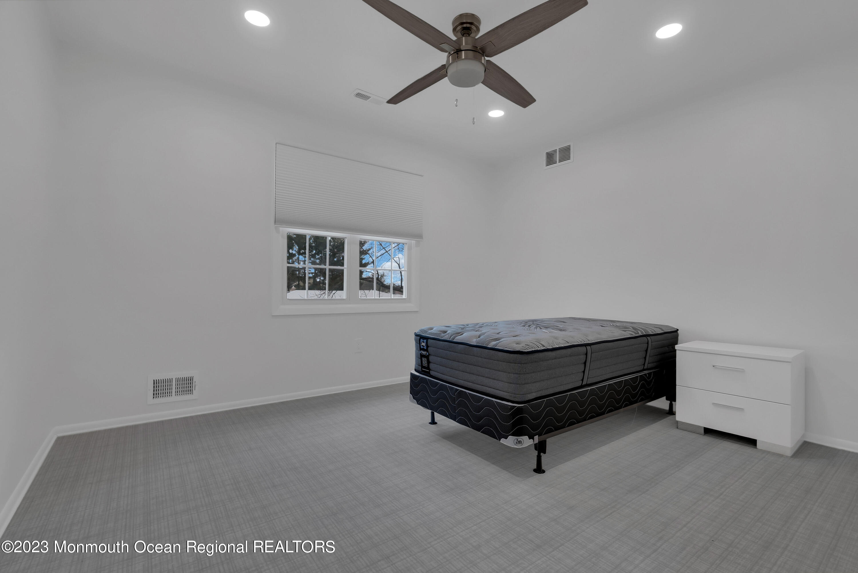 65 Fulton Avenue West Long Branch, NJ 07764 - Photo 17 of 35 a living room with furniture and a ceiling fan