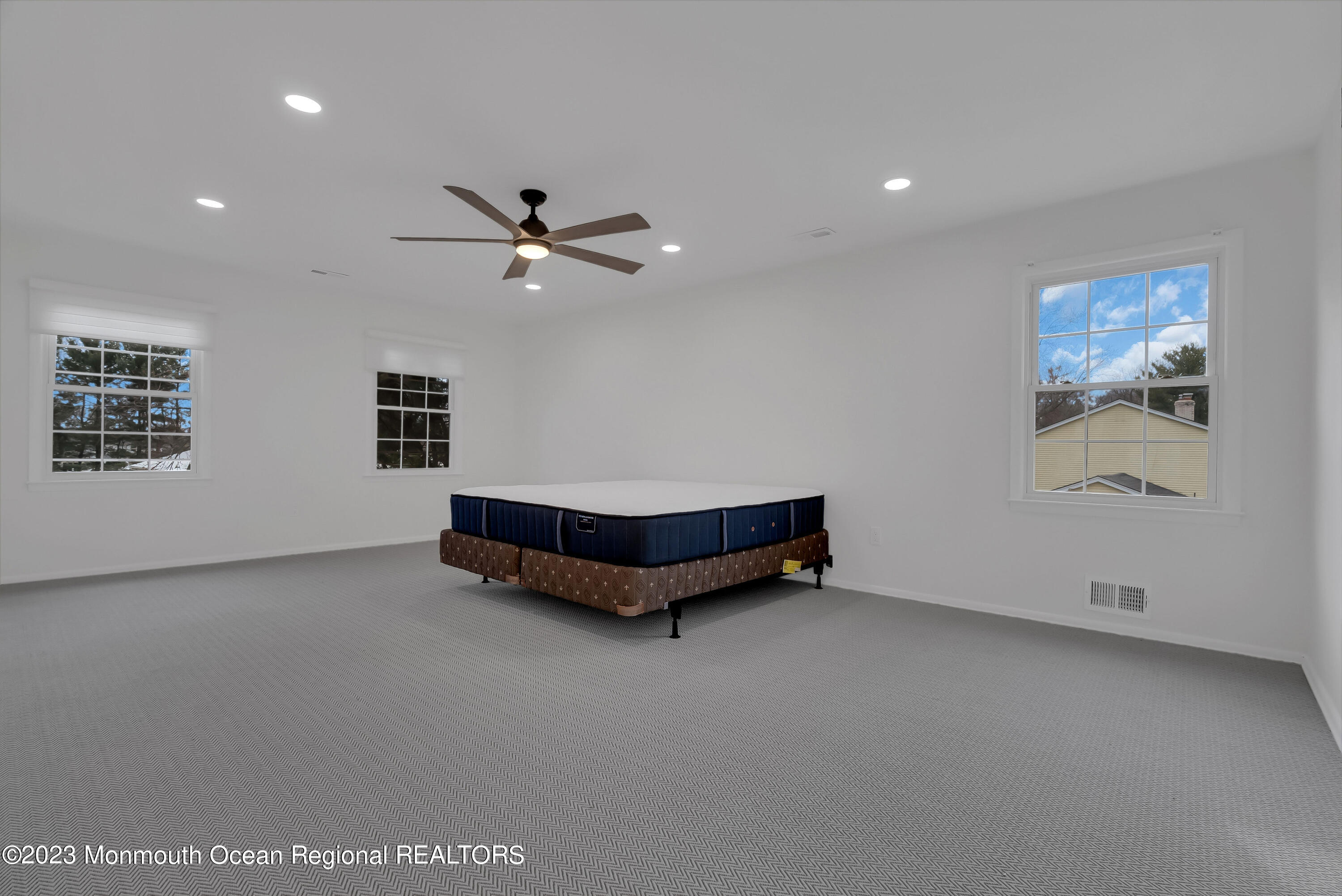 65 Fulton Avenue West Long Branch, NJ 07764 - Photo 21 of 35 a living room with furniture and a ceiling fan