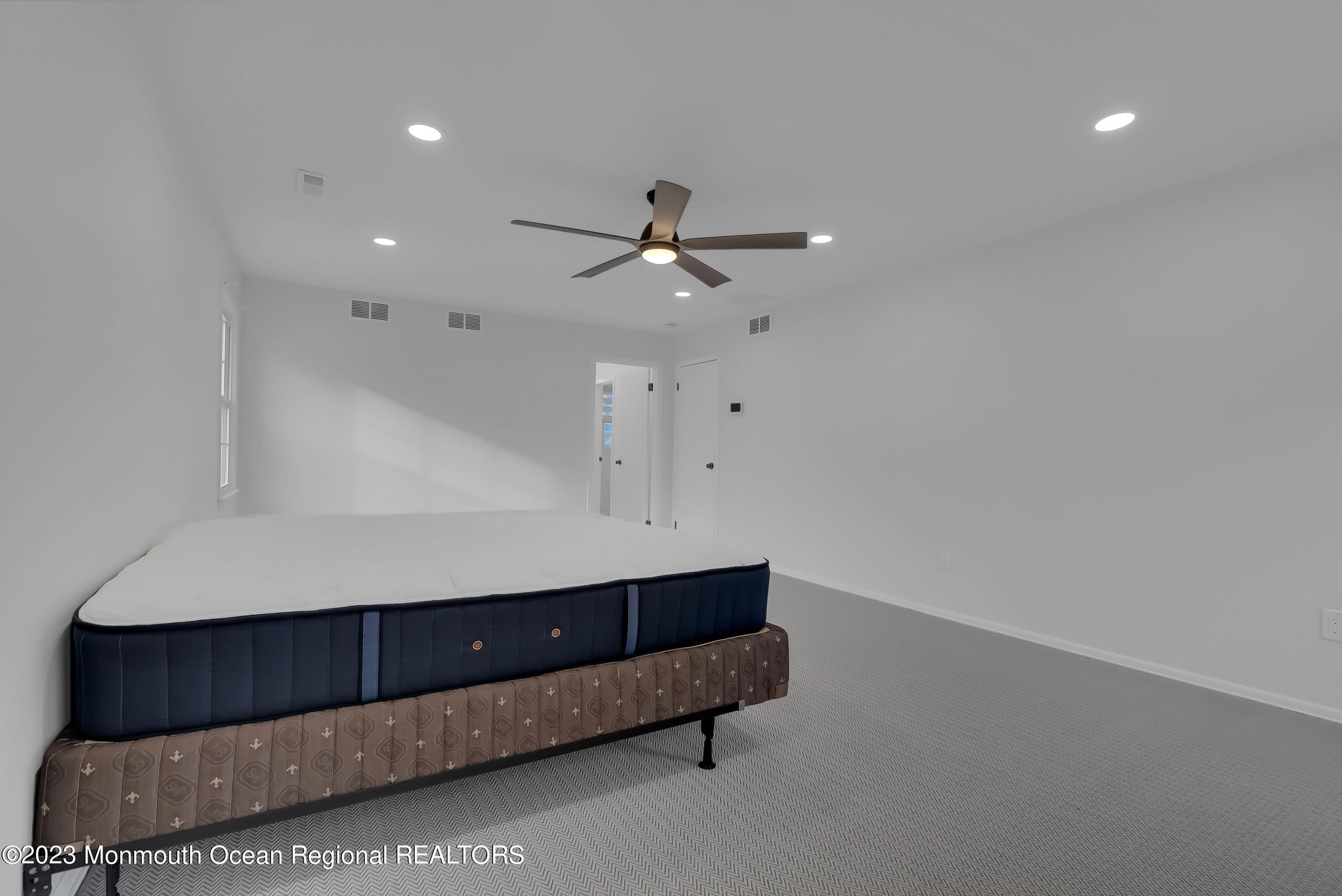 65 Fulton Avenue West Long Branch, NJ 07764 - Photo 22 of 35 a living room with furniture and a ceiling fan