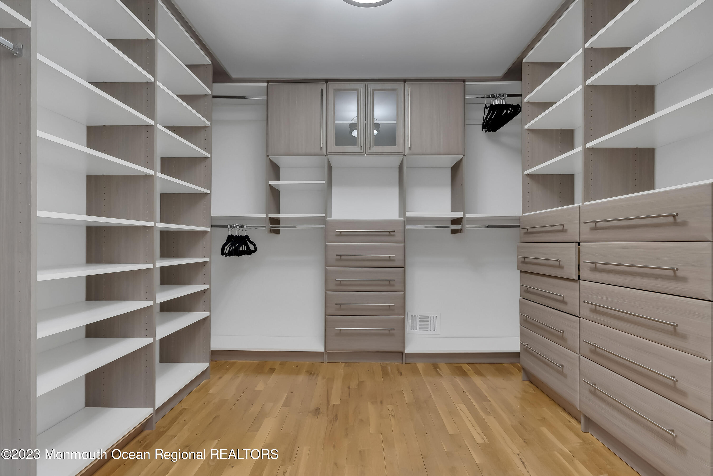 65 Fulton Avenue West Long Branch, NJ 07764 - Photo 23 of 35 a view of walk in closet with empty racks