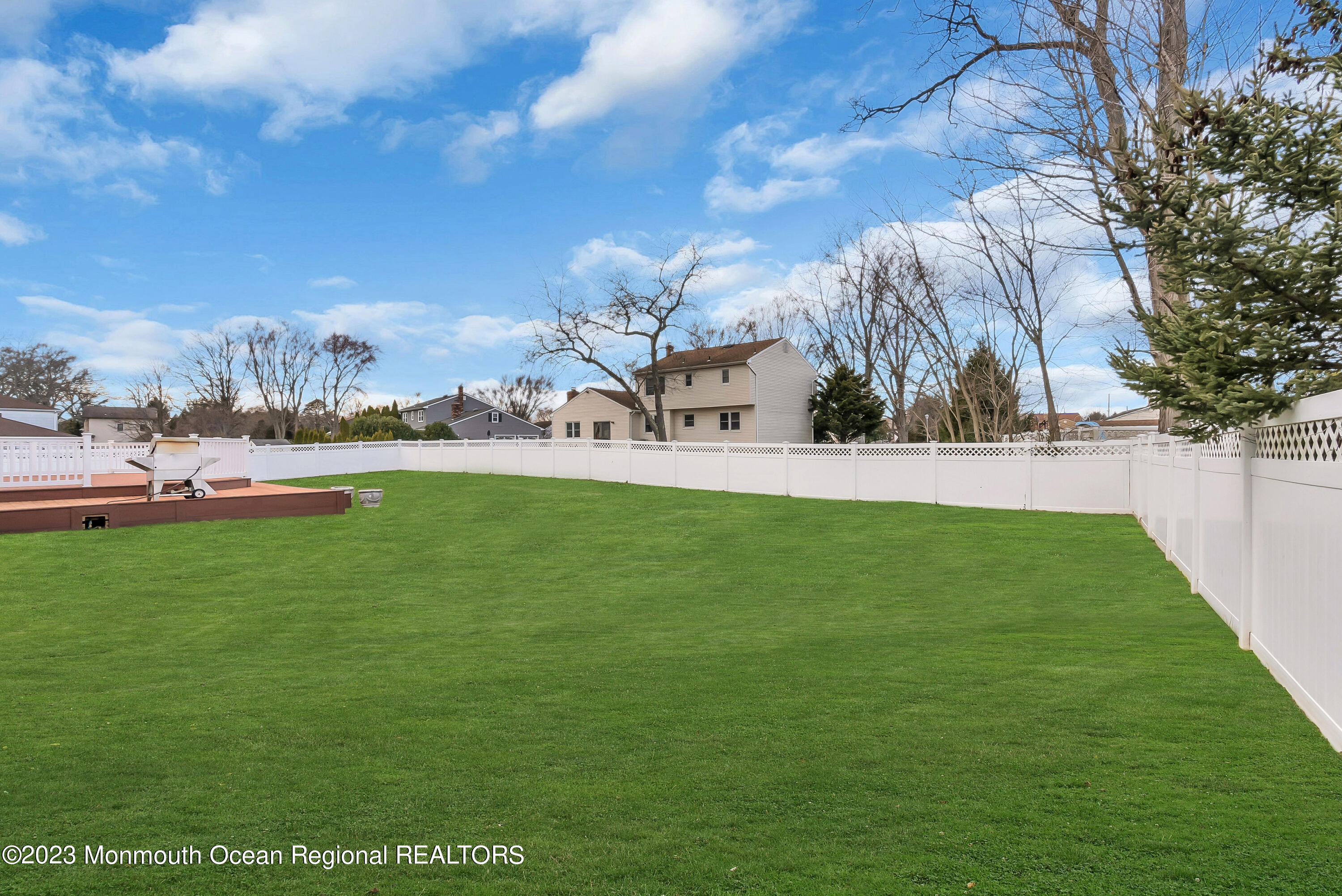 65 Fulton Avenue West Long Branch, NJ 07764 - Photo 29 of 35 a view of yard with grass & palm trees
