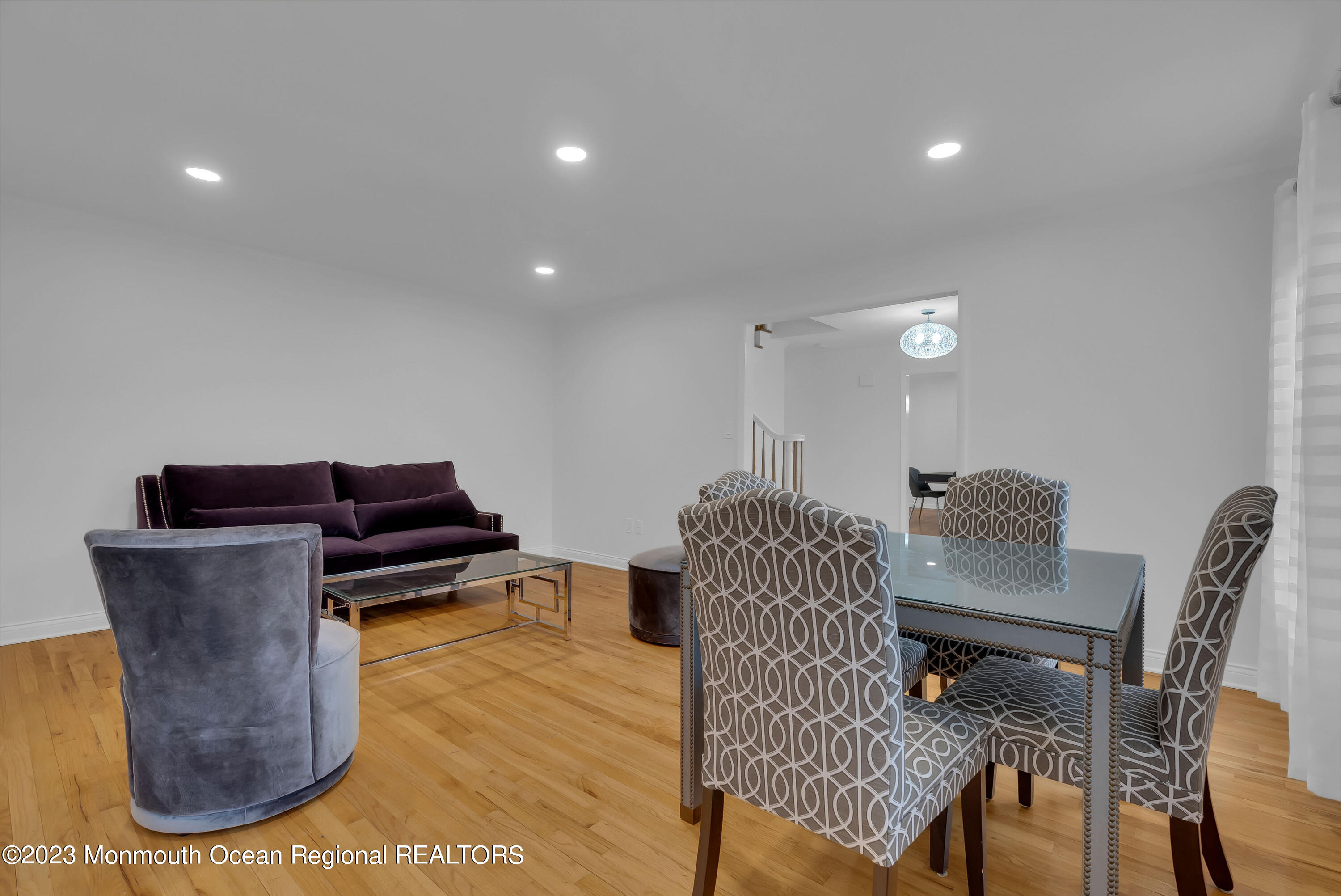 65 Fulton Avenue West Long Branch, NJ 07764 - Photo 5 of 35 a living room with furniture and a chair