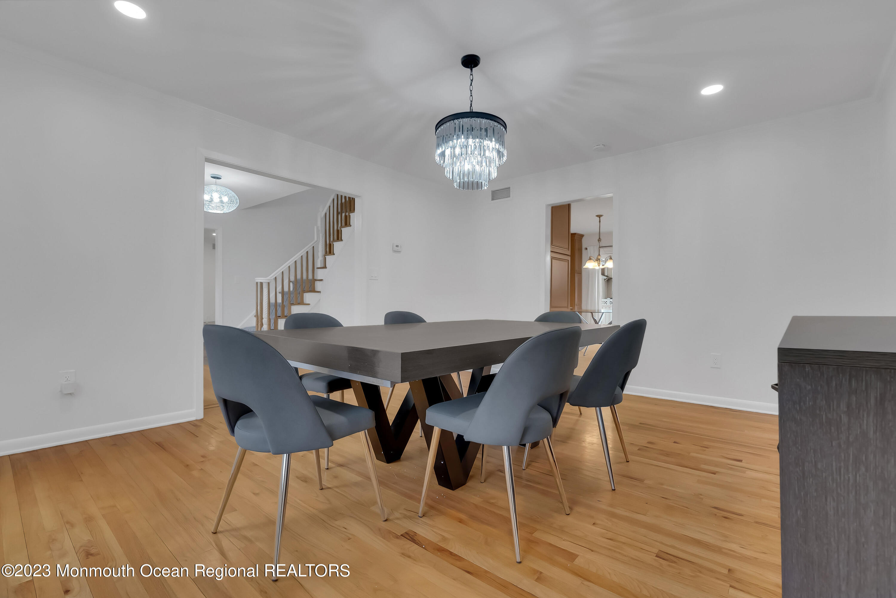 65 Fulton Avenue West Long Branch, NJ 07764 - Photo 7 of 35 a view of a dining room with furniture and wooden floor